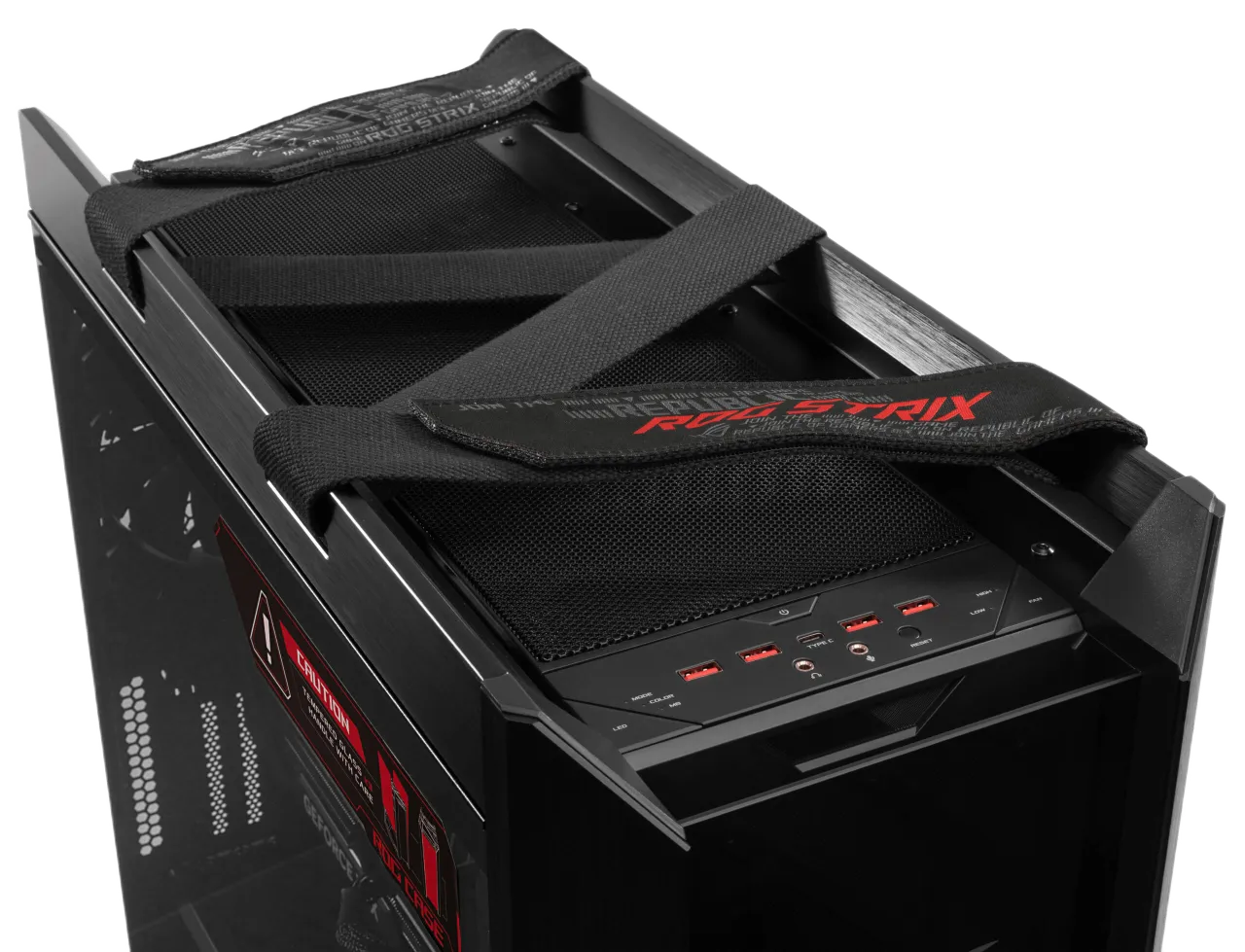 Top view of the ASUS ROG Strix Helios GX601 case showing the stylish fabric carry handles and front I/O panel.